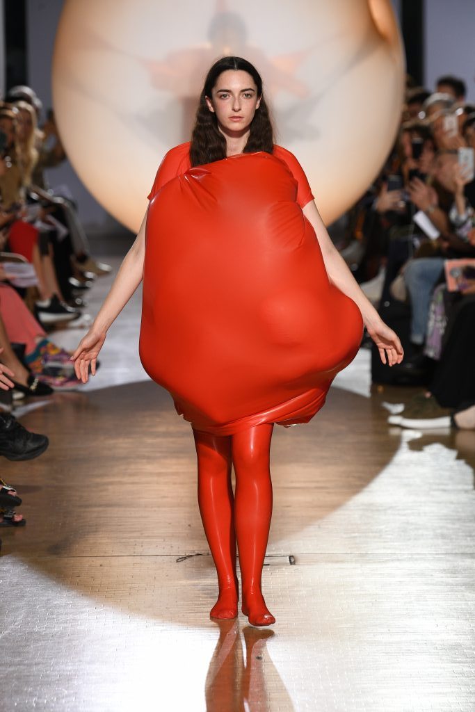 woman wearing deflated re latex bubble dress